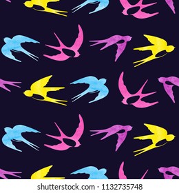 Coloful seamless pattern with watercolor swallows silhouettes.