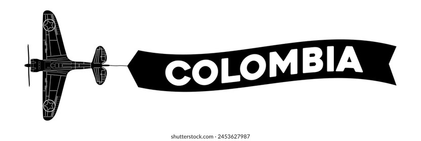 Colombia advertisement banner is attached to the plane