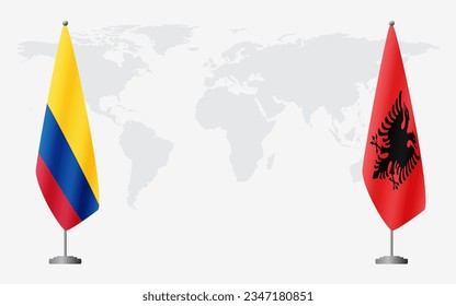 Colombia and Albania flags for official meeting against background of world map.