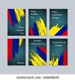Colombia Patriotic Cards for National Day. Expressive Brush Stroke in Flag Colors on dark striped background. Vector Greeting Card.
