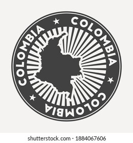 Colombia round logo. Vintage travel badge with the circular name and map of country, vector illustration. Can be used as insignia, logotype, label, sticker or badge of the Colombia.
