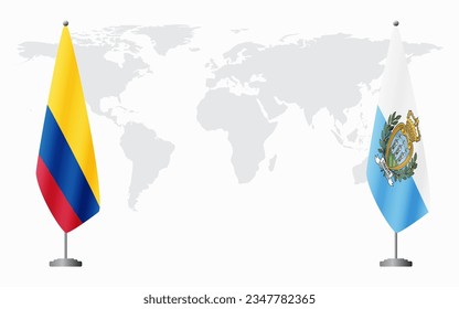 Colombia and San Marino flags for official meeting against background of world map.