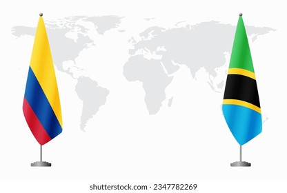 Colombia and Tanzania flags for official meeting against background of world map.
