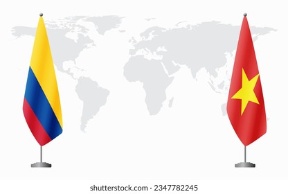 Colombia and Vietnam flags for official meeting against background of world map.