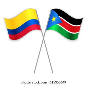 Colombian and South Sudanese crossed flags. Colombia combined with South Sudan isolated on white. Language learning, international business or travel concept.
