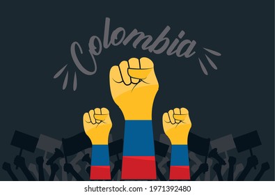 Colombians' hands with fists, protesting banner