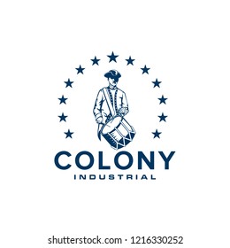 Colony logo design with illustrations of soldiers wearing hats and carrying drum instruments surrounded by stars