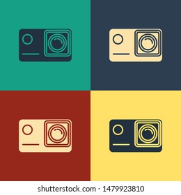 Color Action extreme camera icon isolated on color background. Video camera equipment for filming extreme sports. Vintage style drawing. Vector Illustration