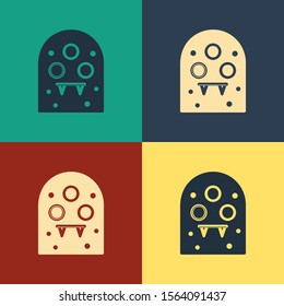 Color Alien icon isolated on color background. Extraterrestrial alien face or head symbol. Vintage style drawing. Vector Illustration