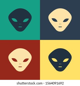 Color Alien icon isolated on color background. Extraterrestrial alien face or head symbol. Vintage style drawing. Vector Illustration