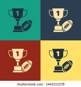 Color Award cup and American football ball icon isolated on color background. Winner trophy symbol. Championship or competition trophy. Vintage style drawing. Vector Illustration