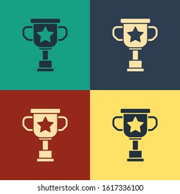 Color Award cup icon isolated on color background. Winner trophy symbol. Championship or competition trophy. Sports achievement sign. Vintage style drawing. Vector Illustration
