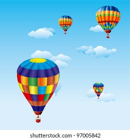 color balloons flying over clouds in sky