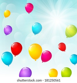 Color balloons on sunny background