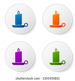 Color Burning candle in candlestick icon on white background. Old fashioned lit candle. Cylindrical aromatic candle stick with burning flame. Set color icon in circle buttons. Vector Illustration
