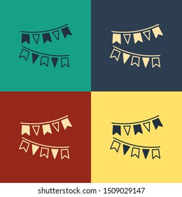 Color Carnival garland with flags icon isolated on color background. Party pennants for birthday celebration, festival and fair decoration. Vintage style drawing. Vector Illustration