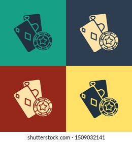 Color Casino chip and playing cards icon isolated on color background. Casino poker. Vintage style drawing. Vector Illustration