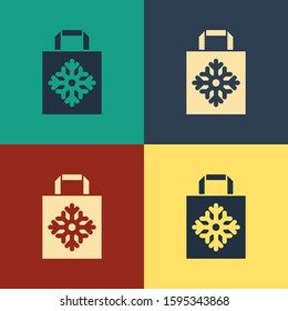 Color Christmas paper shopping bag icon isolated on color background. Package sign. Merry Christmas and Happy New Year. Vintage style drawing. Vector Illustration