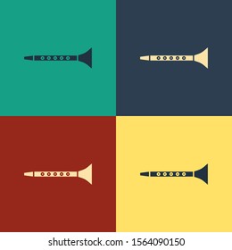 Color Clarinet icon isolated on color background. Musical instrument. Vintage style drawing. Vector Illustration