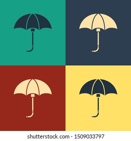 Color Classic elegant opened umbrella icon isolated on color background. Rain protection symbol. Vintage style drawing. Vector Illustration