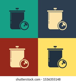 Color Cooking pot and kitchen timer icon isolated on color background. Boil or stew food symbol. Vintage style drawing. Vector Illustration