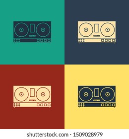 Color DJ remote for playing and mixing music icon isolated on color background. DJ mixer complete with vinyl player and remote control. Vintage style drawing. Vector Illustration