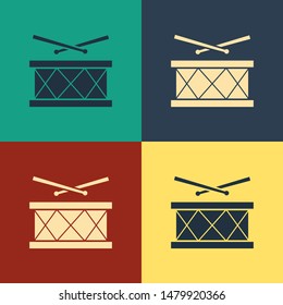 Color Drum with drum sticks icon isolated on color background. Music sign. Musical instrument symbol. Vintage style drawing. Vector Illustration