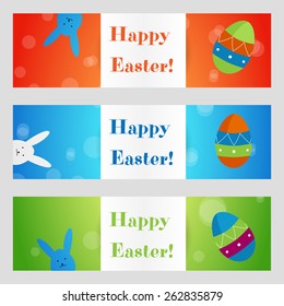 color easter eggs greeting card banner with blue and white rabbit and label on green, blue and orange booked background in horizontal orientations