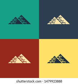 Color Egypt pyramids icon isolated on color background. Symbol of ancient Egypt. Vintage style drawing. Vector Illustration