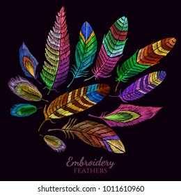 Color feathers embroidery collection fashionable template for design of clothes, t-shirt design. Beautiful feathers of tropical birds classic vector embroidery 