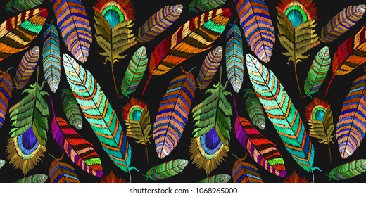 Color feathers embroidery seamless pattern. Beautiful tropical peacock feathers embroidery, template textiles, t-shirt design