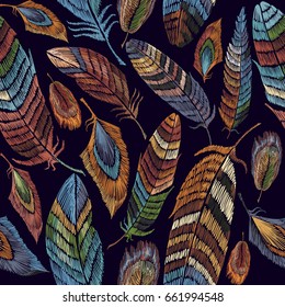 Color feathers embroidery seamless pattern. Beautiful feathers of tropical birds classic embroidery seamless background. Fashionable template for design of clothes, t-shirt design 