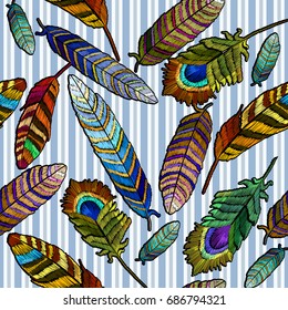 Color feathers embroidery seamless pattern. Beautiful tropical peacock feathers embroidery, hand drawn fashion template for clothes, textiles, t-shirt design