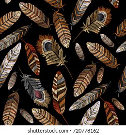 Color feathers embroidery seamless pattern. Beautiful bright tropical peacock feathers embroidery, hand drawn fashion template clothes, textiles, t-shirt design