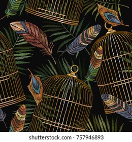 Color feathers and golden cage embroidery seamless pattern. Beautiful feathers of tropical birds classic embroidery seamless background. Fashionable template for design of clothes, t-shirt design 