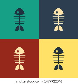 Color Fish skeleton icon isolated on color background. Fish bone sign. Vintage style drawing. Vector Illustration