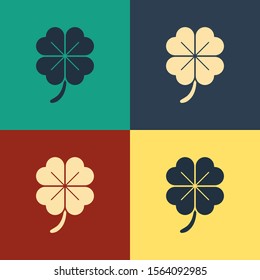 Color Four leaf clover icon isolated on color background. Happy Saint Patrick day. Vintage style drawing. Vector Illustration