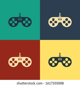 Color Gamepad icon isolated on color background. Game controller. Vintage style drawing. Vector Illustration