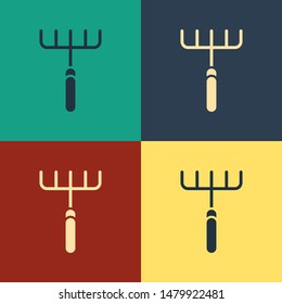 Color Garden rake icon isolated on color background. Tool for horticulture, agriculture, farming. Ground cultivator. Housekeeping equipment. Vintage style drawing. Vector Illustration