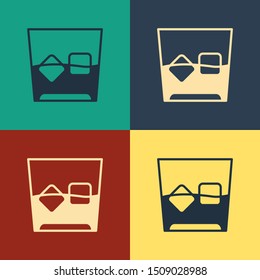 Color Glass of whiskey and ice cubes icon isolated on color background. Vintage style drawing. Vector Illustration