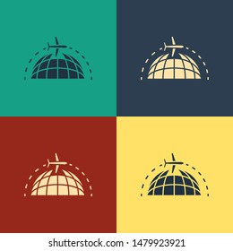 Color Globe with flying plane icon isolated on color background. Airplane fly around the planet earth. Aircraft world icon. Vintage style drawing. Vector Illustration