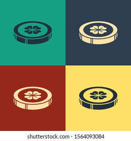 Color Gold coin with four leaf clover icon isolated on color background. Happy Saint Patricks day. Vintage style drawing. Vector Illustration