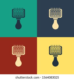 Color Hair brush for dog and cat icon isolated on color background. Brush for animal fur. Pet accessory. Vintage style drawing. Vector Illustration