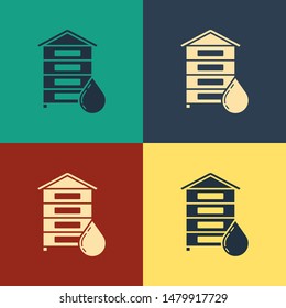 Color Hive for bees icon isolated on color background. Beehive symbol. Apiary and beekeeping. Sweet natural food. Vintage style drawing. Vector Illustration
