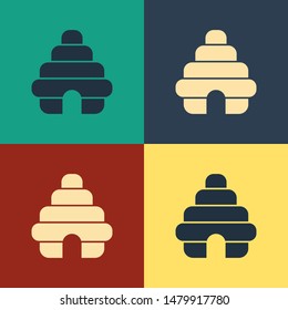 Color Hive for bees icon isolated on color background. Beehive symbol. Apiary and beekeeping. Sweet natural food. Vintage style drawing. Vector Illustration