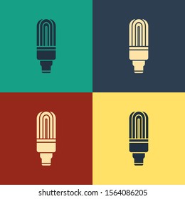 Color LED light bulb icon isolated on color background. Economical LED illuminated lightbulb. Save energy lamp. Vintage style drawing. Vector Illustration