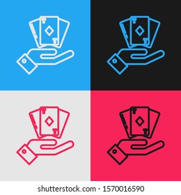 Color line Hand holding deck of playing cards icon isolated on color background. Casino gambling. Vintage style drawing. Vector Illustration