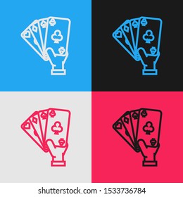 Color line Hand holding playing cards icon isolated on color background. Casino game design. Vintage style drawing. Vector Illustration