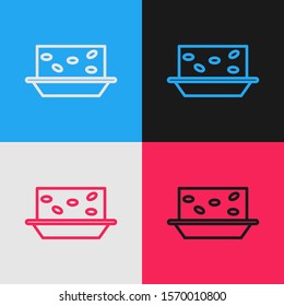 Color line Nougat with nuts icon isolated on color background. Vintage style drawing. Vector Illustration