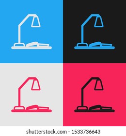 Color line Workplace with table lamp and open book icon isolated on color background. Table office lamp. Vintage style drawing. Vector Illustration